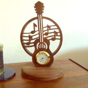 Wood carved ukulele clock